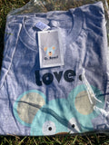 Gray t-shirt with 'Love, O. Bear!' and bear design, on grass