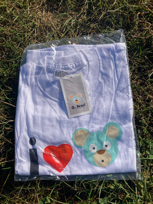 O. Bear t-shirt with a bear design and 'I love' heart on grass